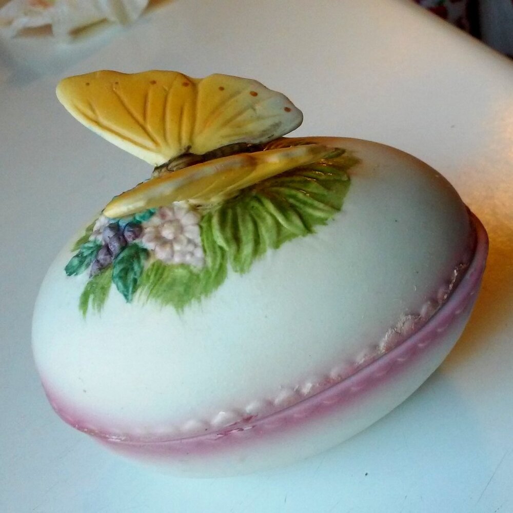 Ceramic Egg With BUtterfly And Flowers 3 3/4" Long 3 1/4" High 2 1/2" Wide